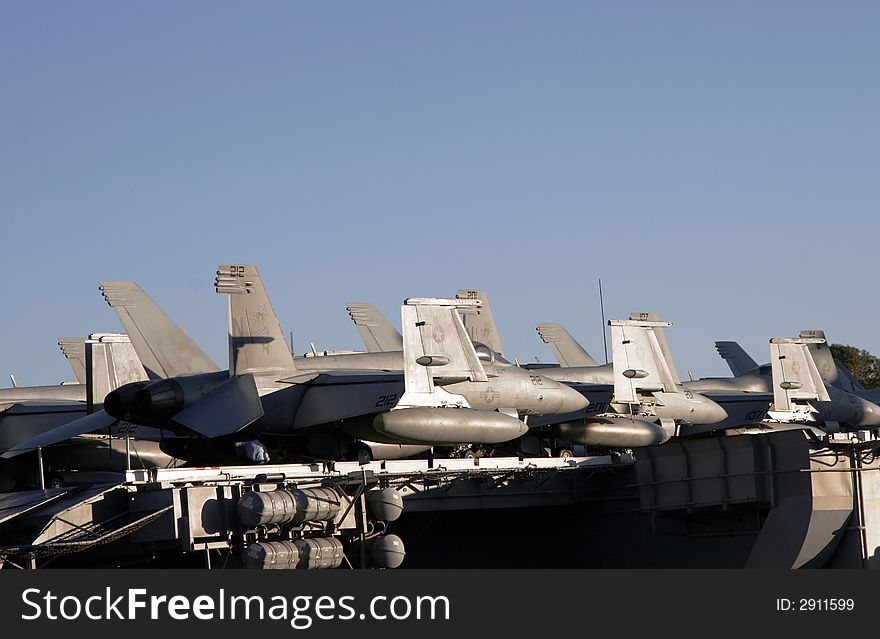 American Fighter Jets On The Flight Deck Of An Aircraft Carrier