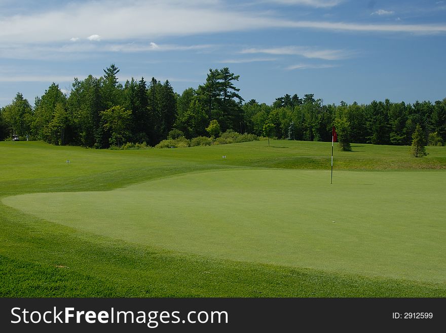 A putting green on a golf course in Rockland, Canada