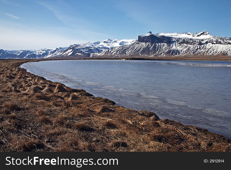 Lake in Iceland with mountains. Lake in Iceland with mountains