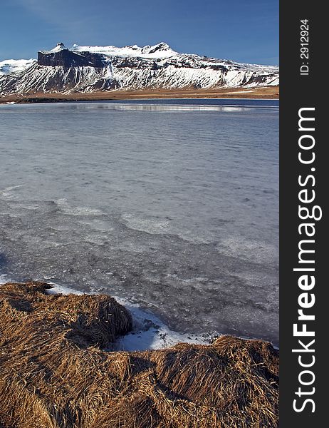 Lake in Iceland with mountains. Lake in Iceland with mountains