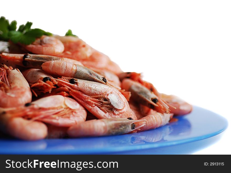Prepared shrimp on a plate.