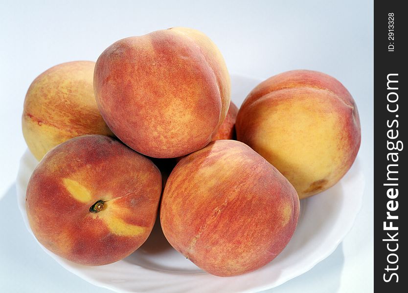 Still life with fruits. Fresh delicious peaches.