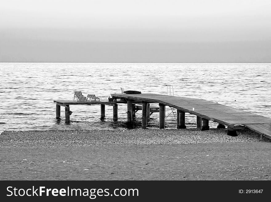 Beach in the evening at sunset on the sea. Portrait orientation.