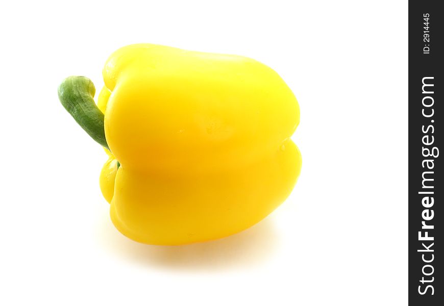 Yellow sweet ripe pepper on white background. Yellow sweet ripe pepper on white background