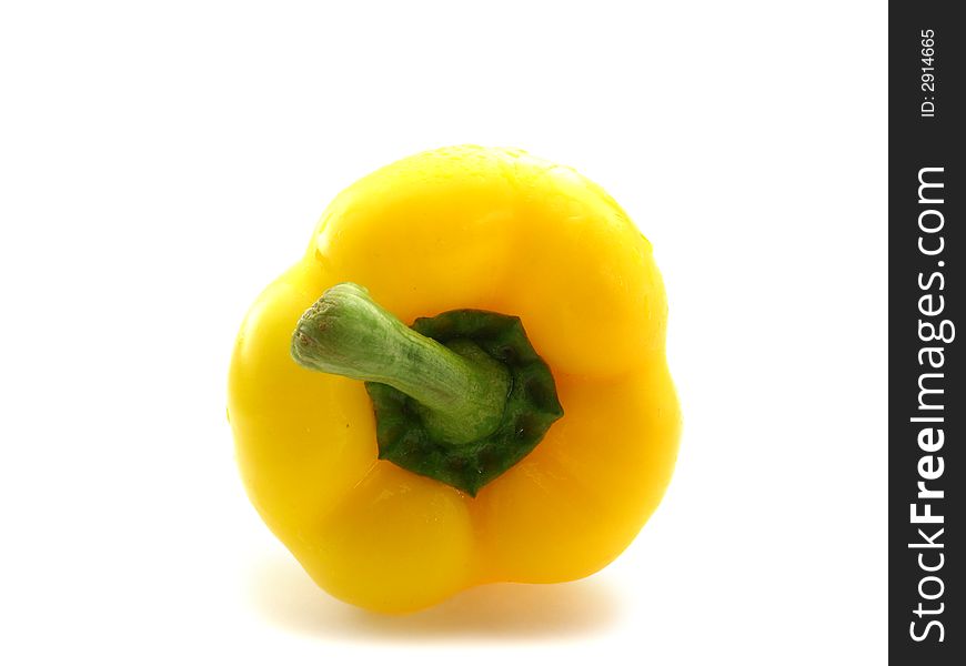 Yellow sweet ripe pepper on white background. Yellow sweet ripe pepper on white background