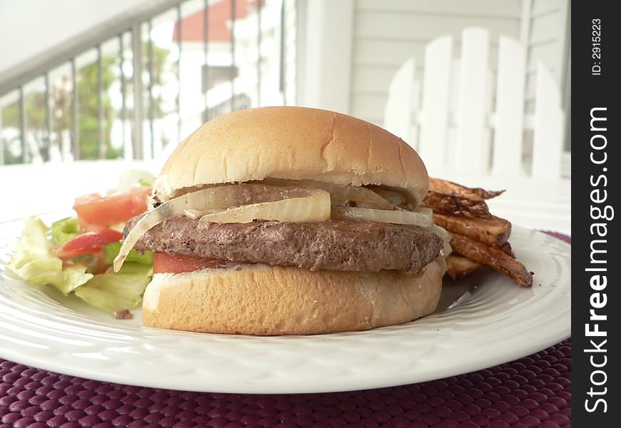 Burger with salad and fries