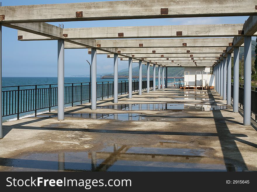 Beach structure on seacoast during deserted inter-season period