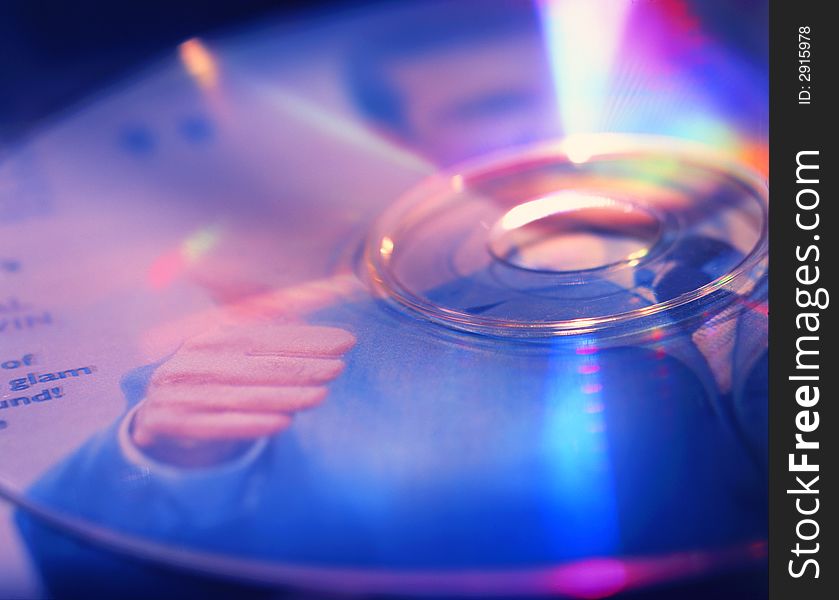 cd disk on a dark blue background. cd disk on a dark blue background