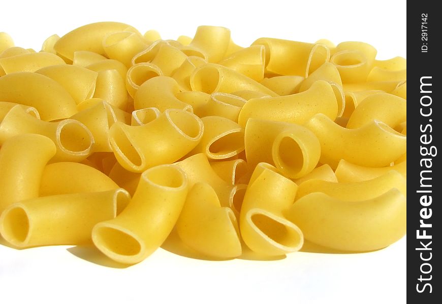 Macro of uncooked macaroni pasta background