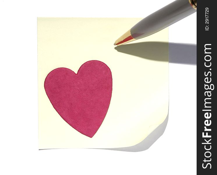 Yellow Blank Post-It Note With A Red Heart And Pen, Space For Own Text, Background. Yellow Blank Post-It Note With A Red Heart And Pen, Space For Own Text, Background