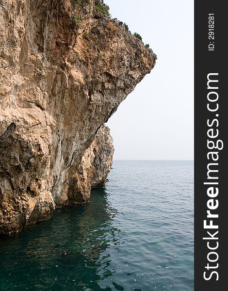 High rock cliff jumping into the sea. High rock cliff jumping into the sea