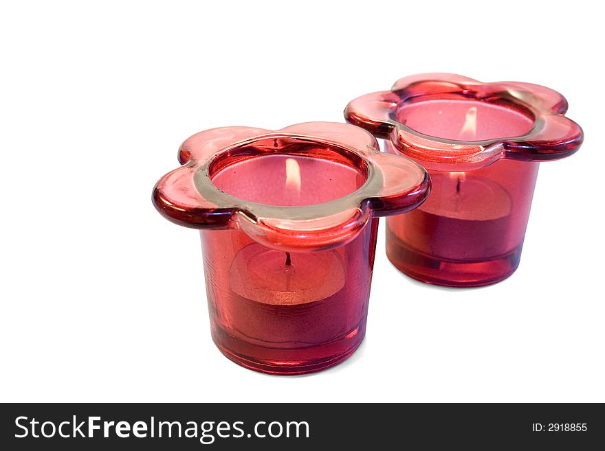 Red candle holders isolated on white