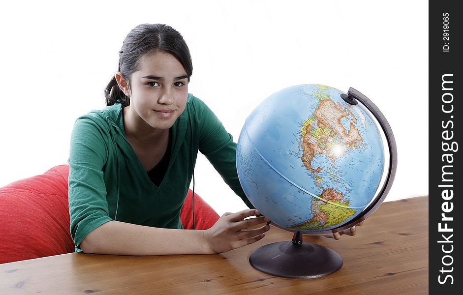 Girl with a globe of the world over white background