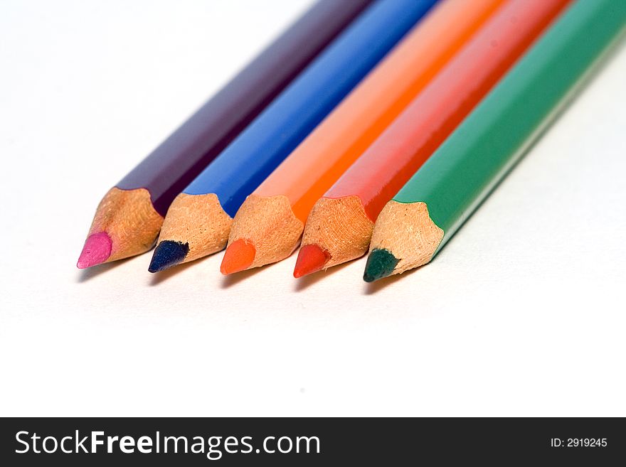 Set of aligned crayons isolated over a white background. Set of aligned crayons isolated over a white background.