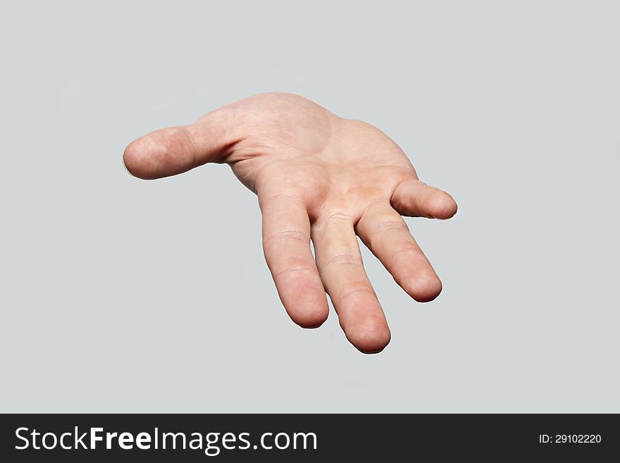 Hand on a gray background, which asks for something or offers.