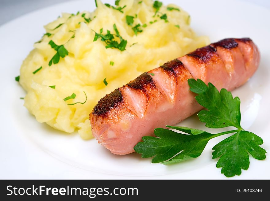 Sausage with potatoes and parsley