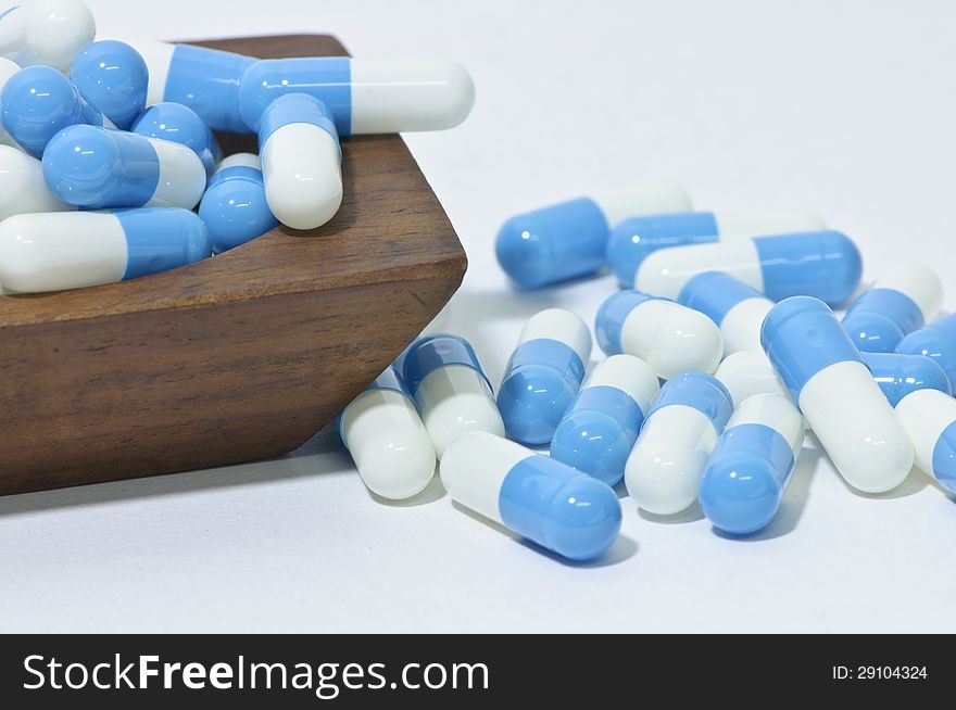 Pills on white background, close up of pharmaceutical pills. Pills on white background, close up of pharmaceutical pills