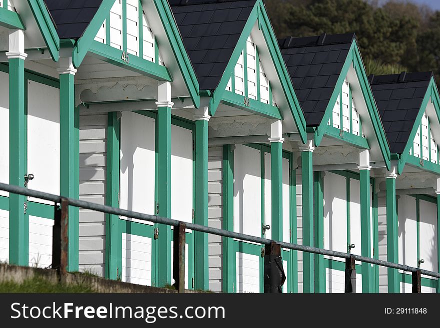 Row of beach huts on south Wales coast, after refurbishment. Row of beach huts on south Wales coast, after refurbishment