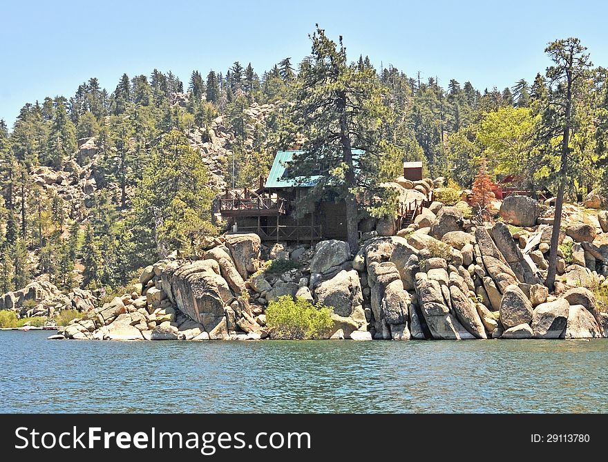 This is a cabin located in a boulder strewn area at the west end of Big Bear Lake near the dam. This is a cabin located in a boulder strewn area at the west end of Big Bear Lake near the dam.