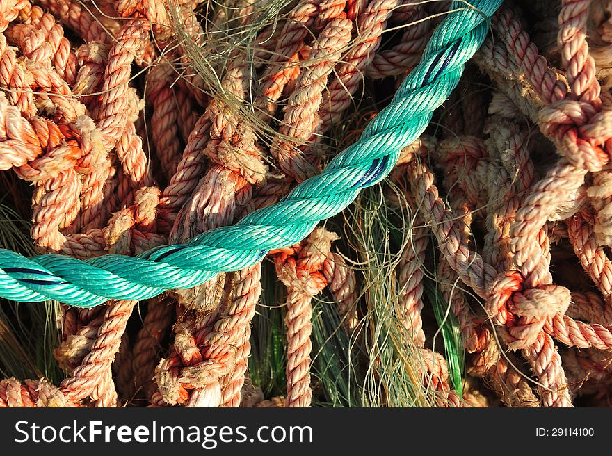 Close-up of colorful and frayed nylon ropes used in the Lobster industry in New England. Close-up of colorful and frayed nylon ropes used in the Lobster industry in New England