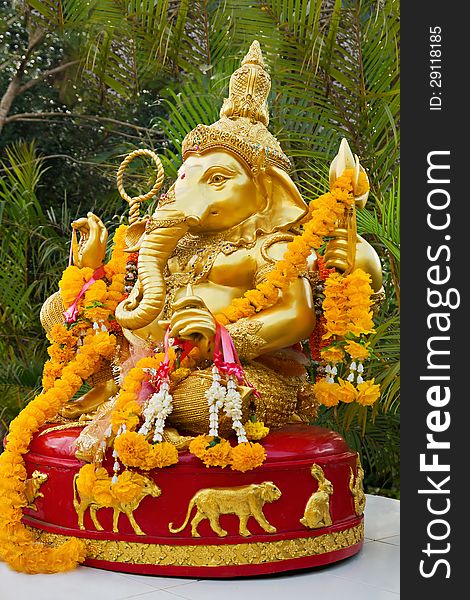 Lord Ganesha statue decorated with flowers