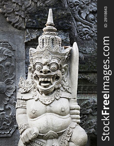 BALI, INDONESIA - FEBRUARY 17: Ornate monster statue at Ulun Danu temple on February, 17, 2011, Bali, Indonesia. BALI, INDONESIA - FEBRUARY 17: Ornate monster statue at Ulun Danu temple on February, 17, 2011, Bali, Indonesia