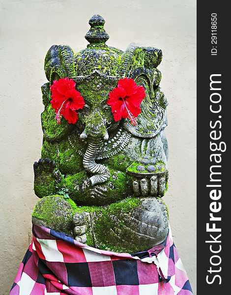 BALI, INDONESIA - FEBRUARY 17: Ornate monster statue at Ulun Danu temple on February, 17, 2011, Bali, Indonesia. BALI, INDONESIA - FEBRUARY 17: Ornate monster statue at Ulun Danu temple on February, 17, 2011, Bali, Indonesia