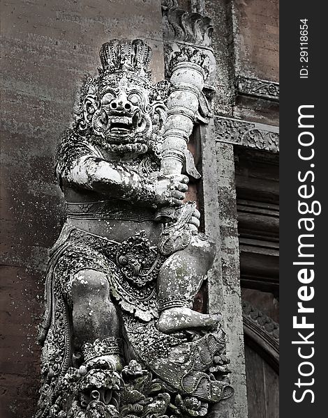 BALI, INDONESIA - FEBRUARY 26: Ornate monster statue at Ulun Danu temple on February, 26, 2011, Bali, Indonesia