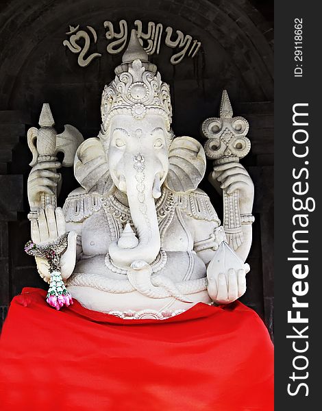 BALI, INDONESIA - FEBRUARY 26: White Ganesha statue at Ulun Danu temple on February, 26, 2011, Bali, Indonesia. Ganesha is a most powerful hindu god. BALI, INDONESIA - FEBRUARY 26: White Ganesha statue at Ulun Danu temple on February, 26, 2011, Bali, Indonesia. Ganesha is a most powerful hindu god.