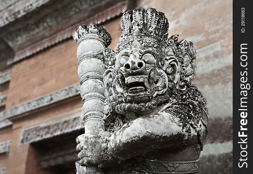 BALI, INDONESIA - FEBRUARY 26: Ornate monster statue at Ulun Danu temple on February, 26, 2011, Bali, Indonesia