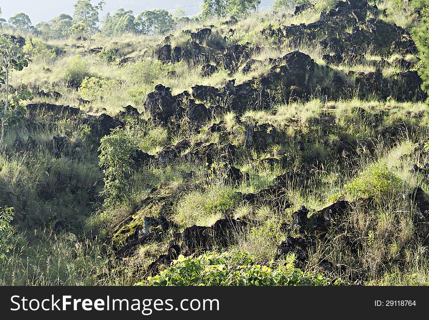 Clinker on earth near Batur volcano