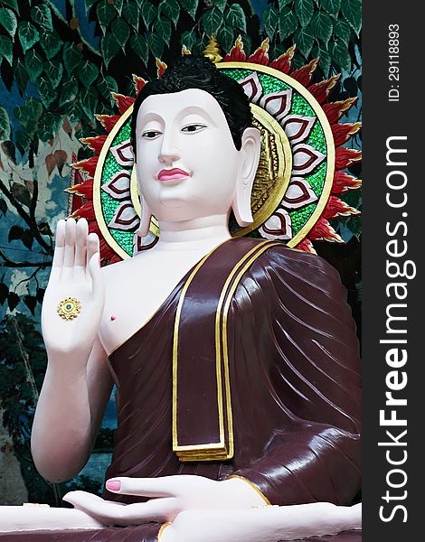 Buddha statue on the beauty background