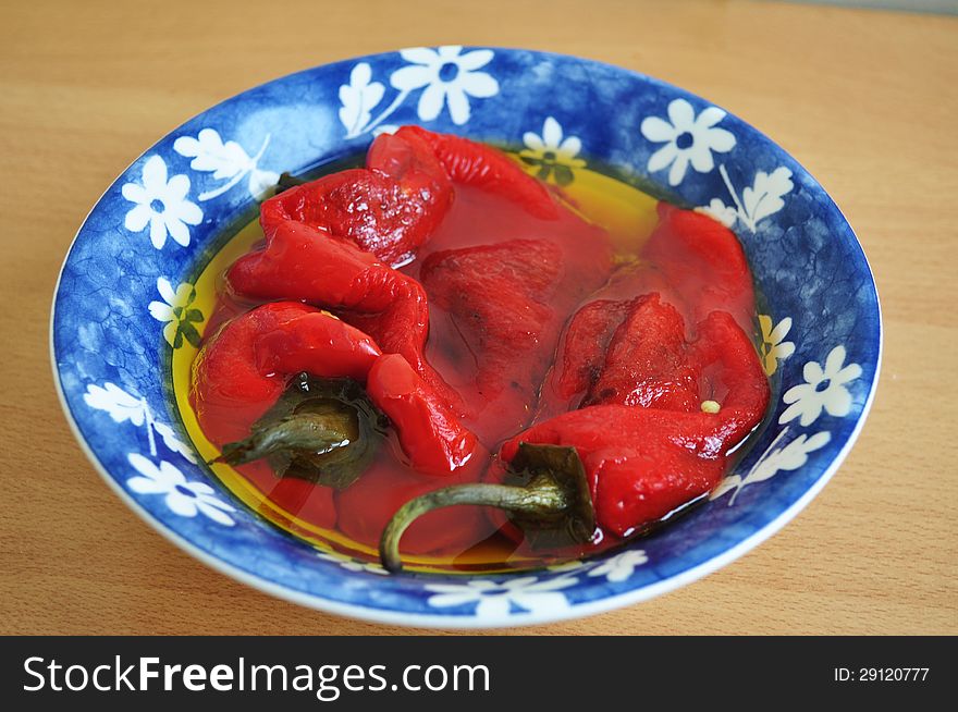 Fresh roasted red pepper in olive oil.