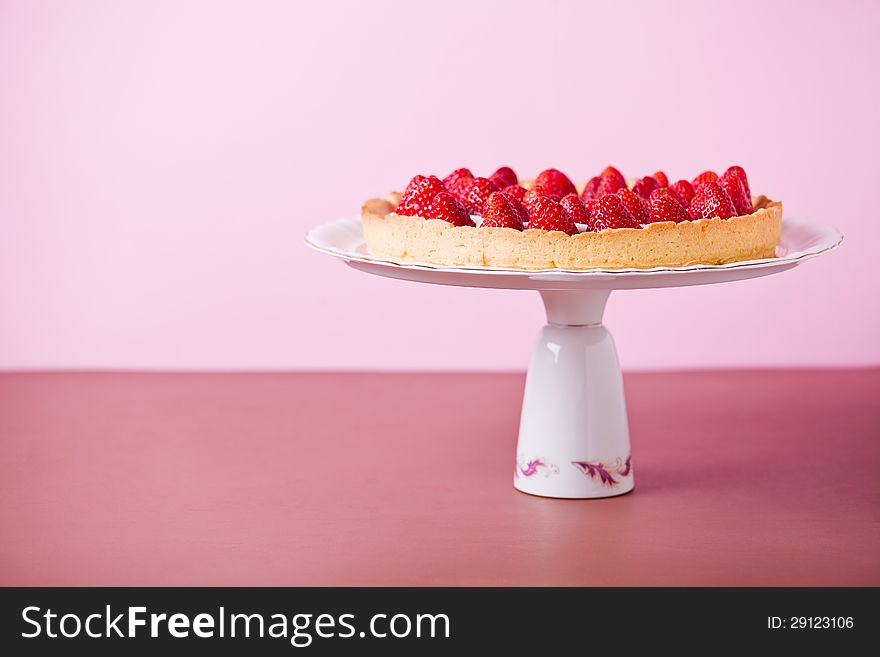 Photograph of a fresh and tasty strawberry pie