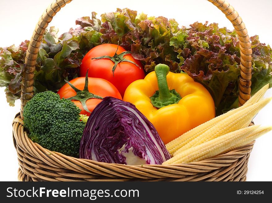 Mix vegetables in wood basket. Mix vegetables in wood basket.