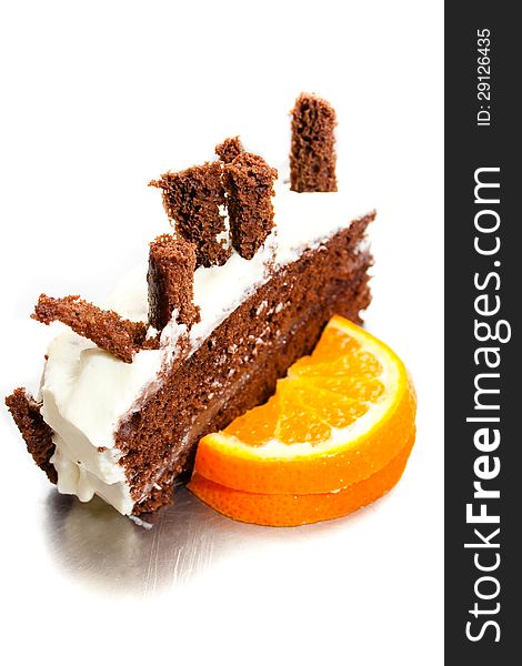 Fresh cake with cream, tofee and orange isolated white. Fresh cake with cream, tofee and orange isolated white