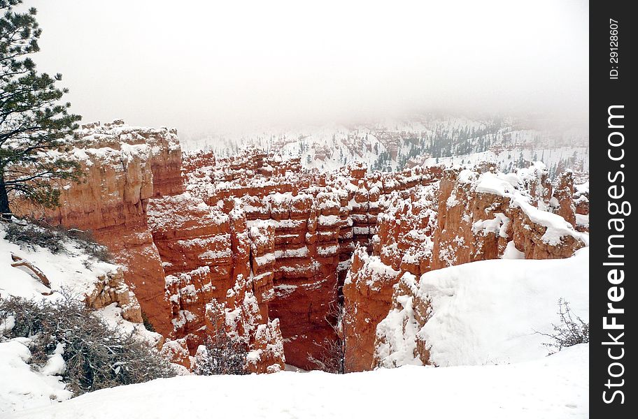 View of Bryce Canyon National Park in southern Utah during a winter snow storm. View of Bryce Canyon National Park in southern Utah during a winter snow storm.