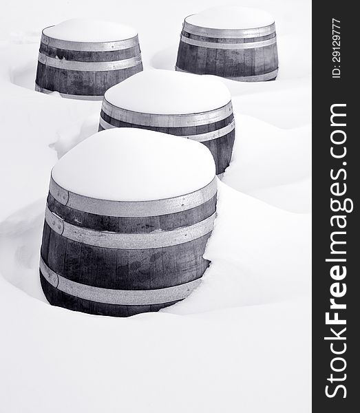 Four wine barrels buried in the snow #1. Four wine barrels buried in the snow #1.