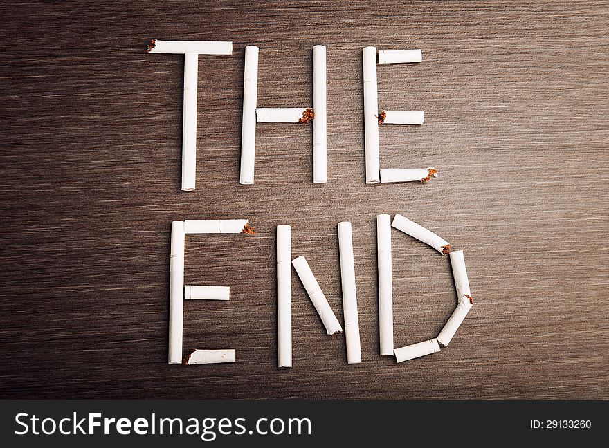 Concept of the dangers of smoking. the word the end of cigarettes. Concept of the dangers of smoking. the word the end of cigarettes