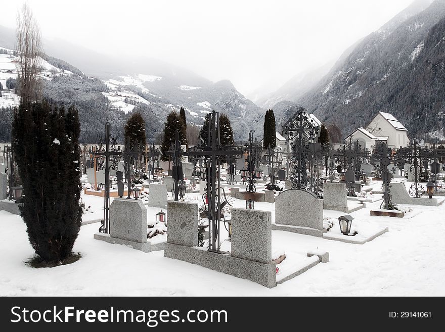 Cemetery in fog in Val Pusteria