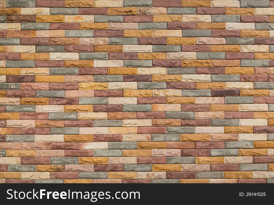 Multi color brick wall to design as background