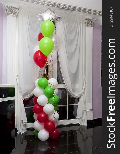 Festively decorated by balloons Italian restaurant interior. Festively decorated by balloons Italian restaurant interior