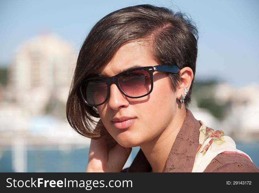 Portrait of young girl in sunglasses