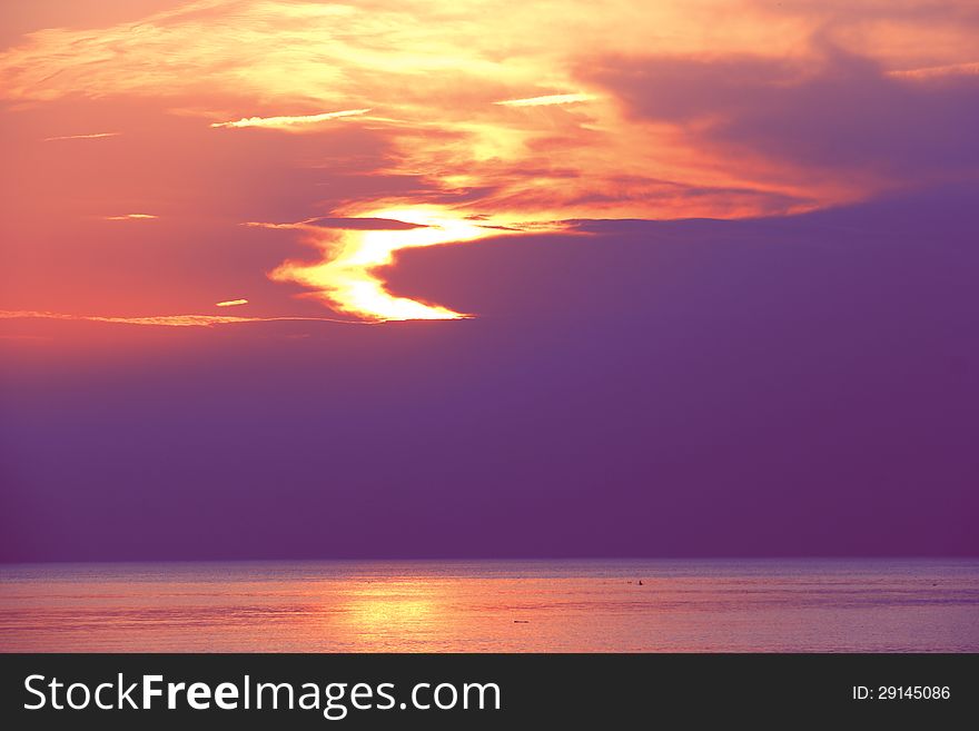 Dark purple sunset over the gulf of Riga in Saulkrasti. Latvia. Dark purple sunset over the gulf of Riga in Saulkrasti. Latvia.