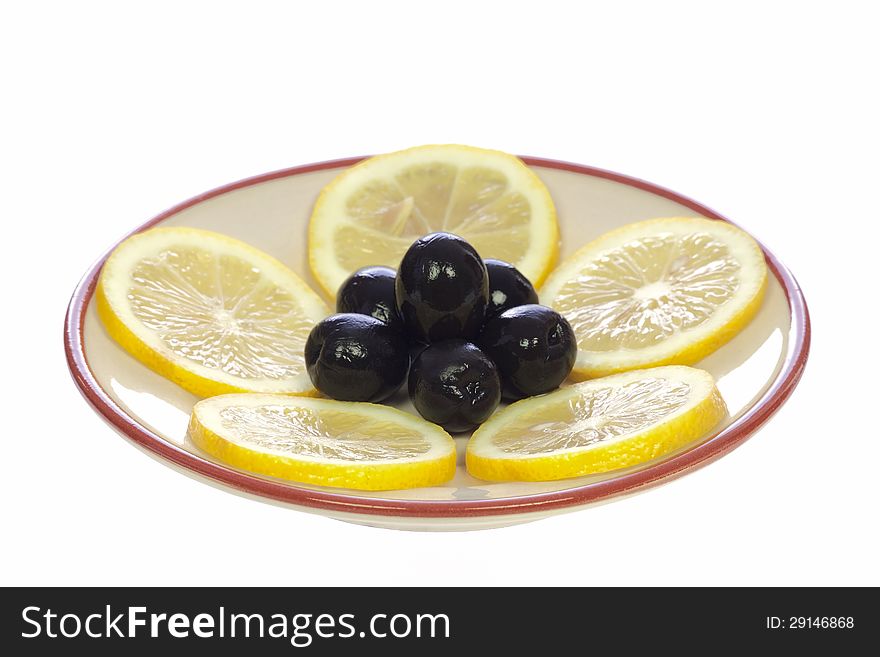 Lemons And Olives On The Saucer