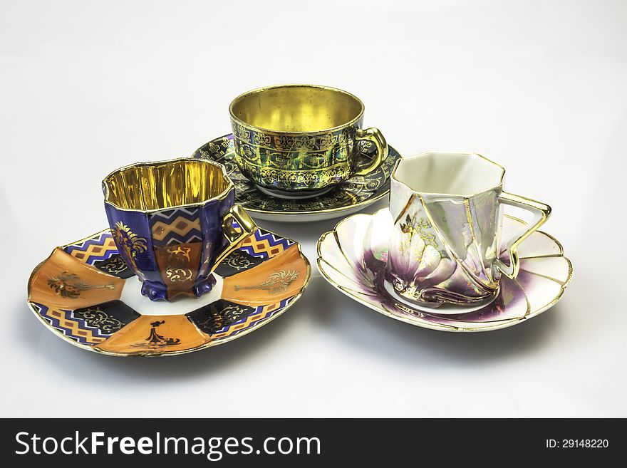 The historic, decorated porcelain cups for drinking tea. The historic, decorated porcelain cups for drinking tea.