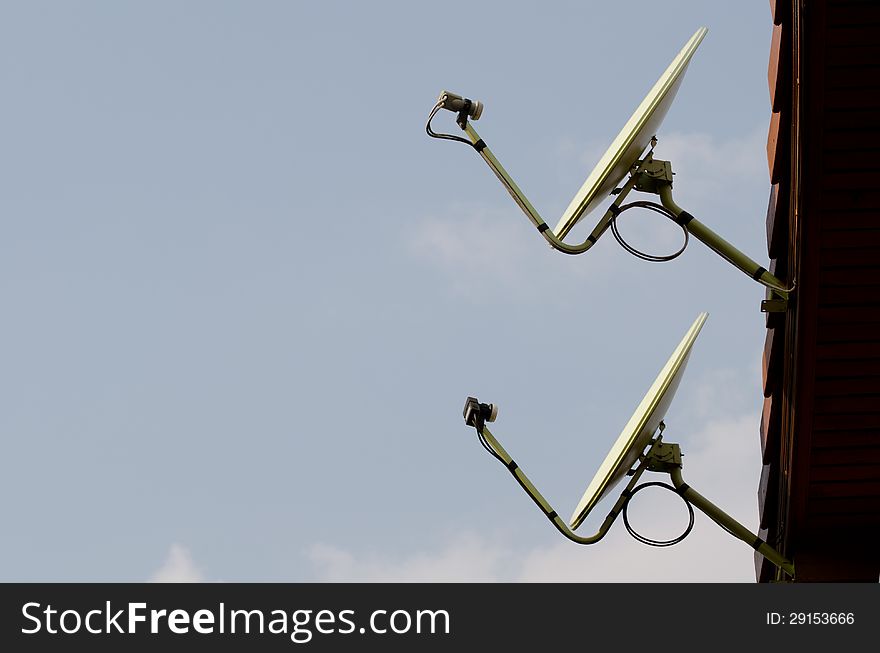 Communication satellite dish on top roof. Communication satellite dish on top roof