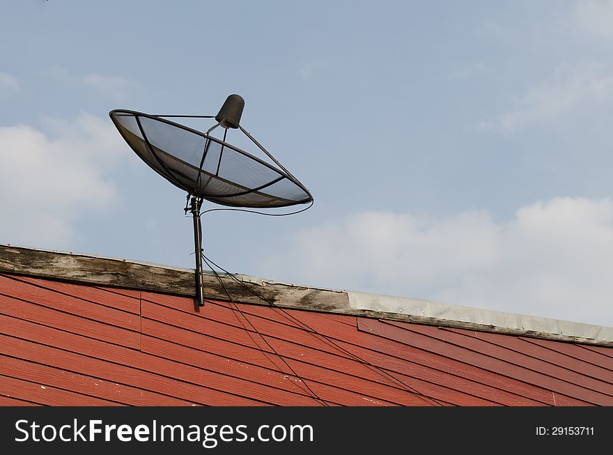 Communication satellite dish on top roof. Communication satellite dish on top roof