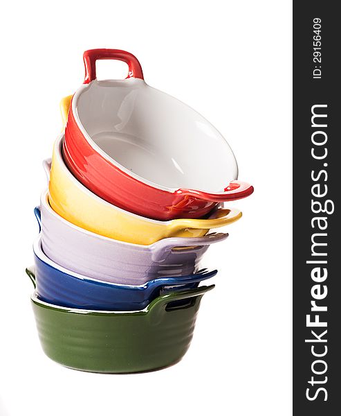 Assorted colorful bowls on white background. Assorted colorful bowls on white background