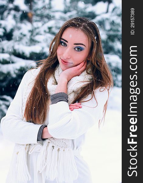 Outdoor sensual portrait of pretty young woman in winter park. Outdoor sensual portrait of pretty young woman in winter park